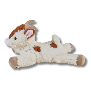 Plush toy goat on a white background