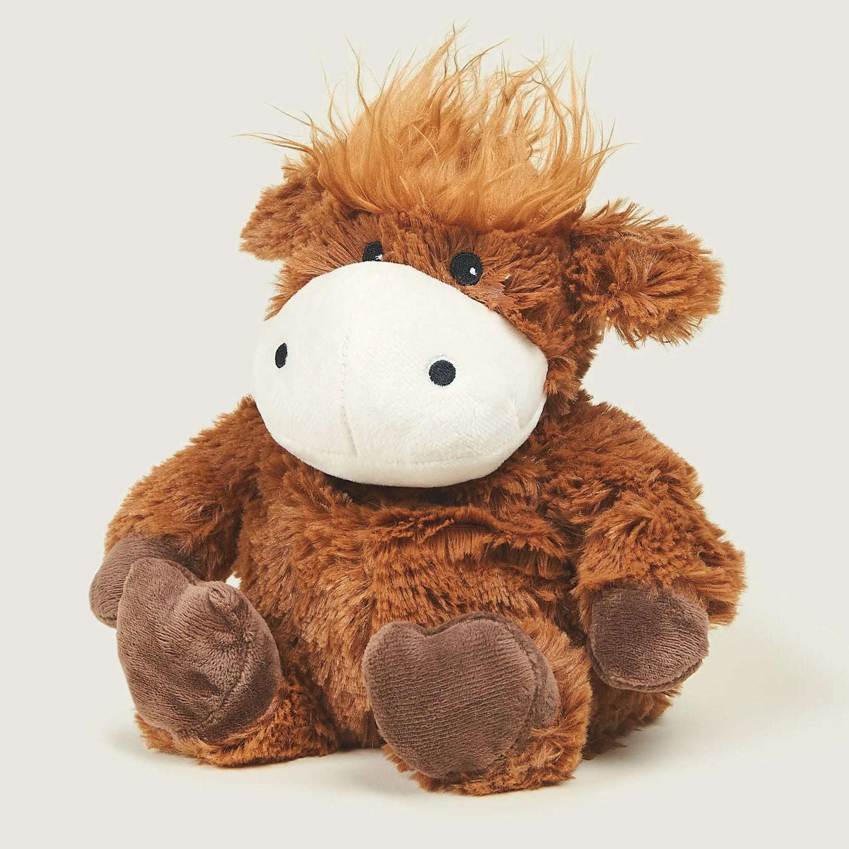 Brown plush horse toy on a white background
