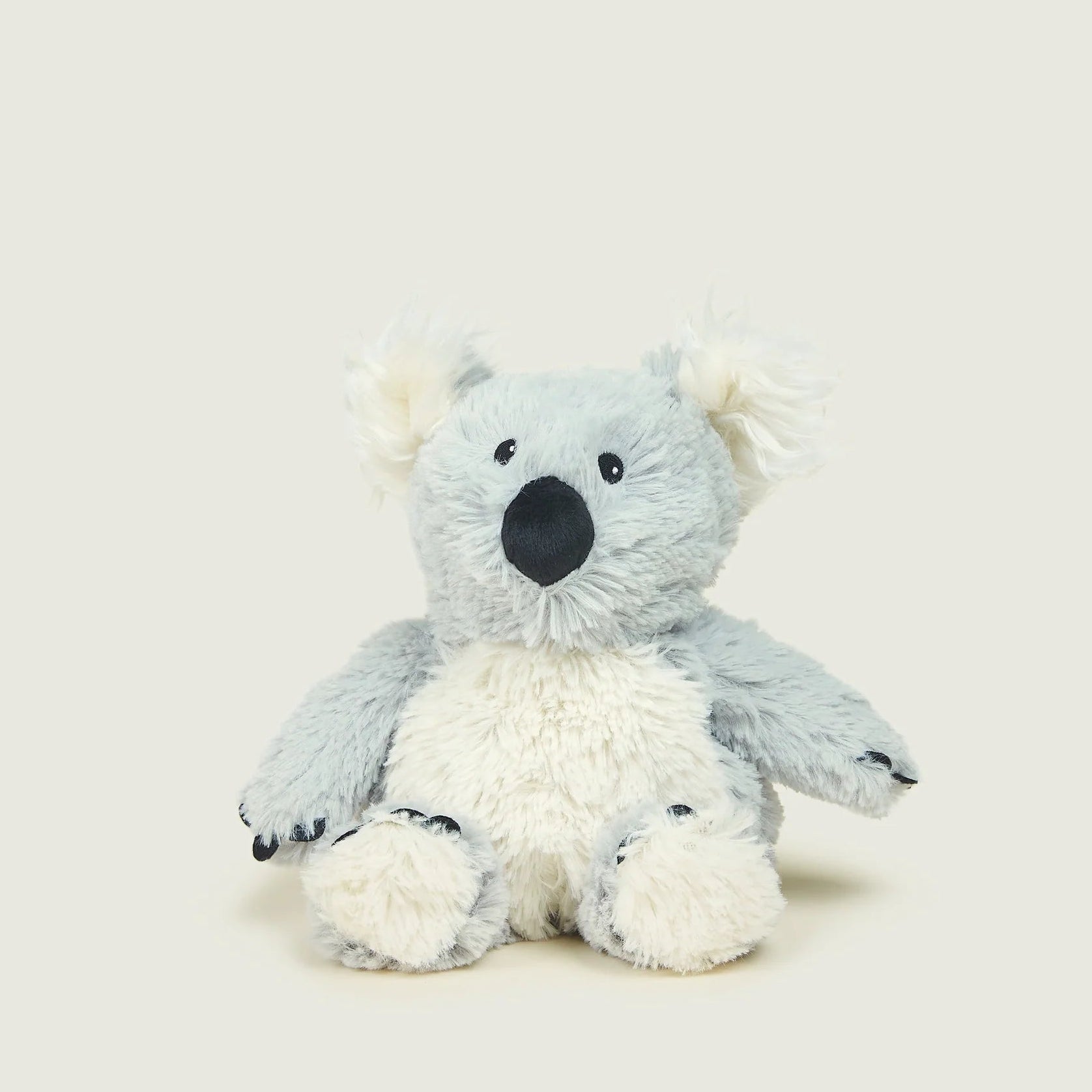 Plush toy koala on a light gray background