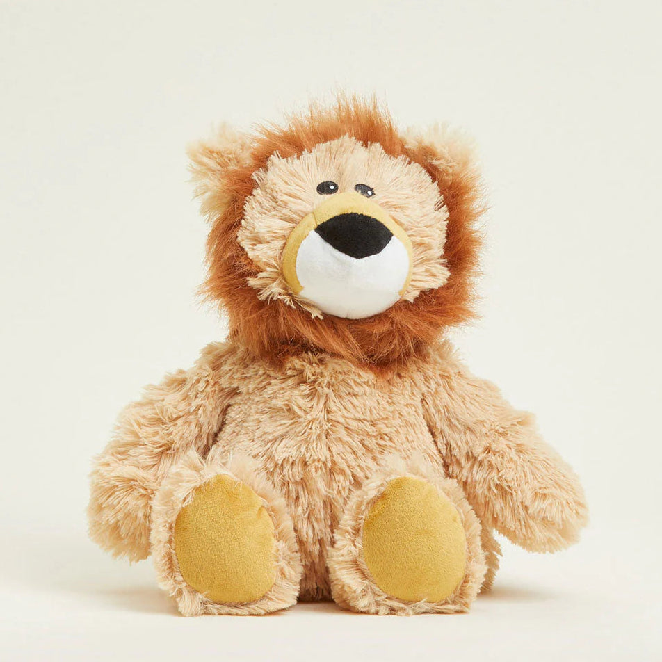Plush lion toy on a white background