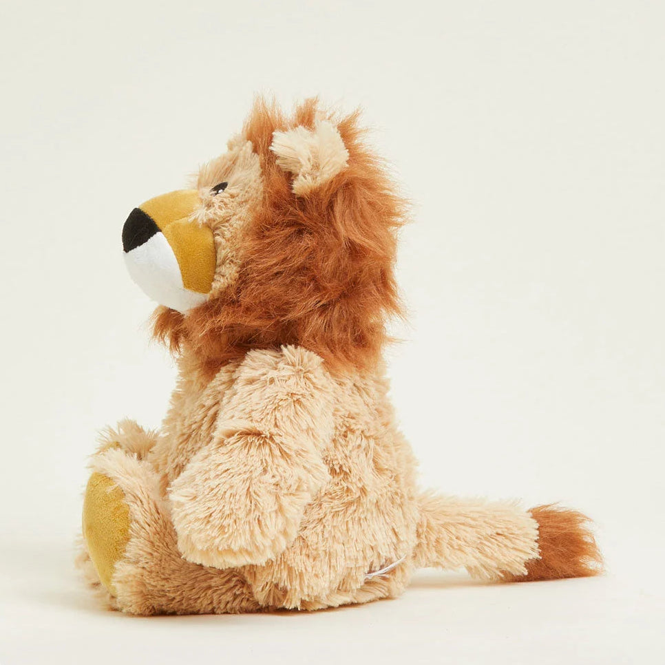 Plush lion toy on a light background
