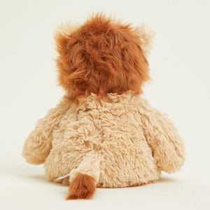 Plush lion toy on a white background