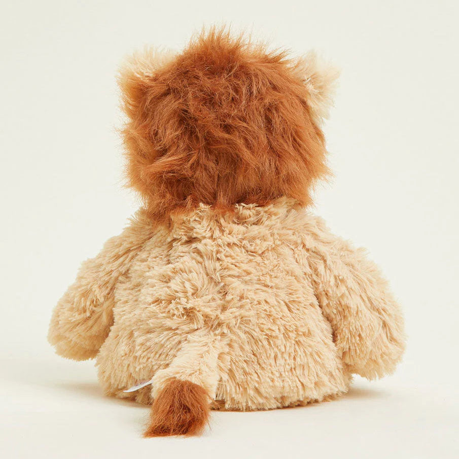 Plush lion toy on a white background