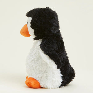 A plush penguin toy with black and white fur, an orange beak, and orange feet, shown from the side against a plain light background.