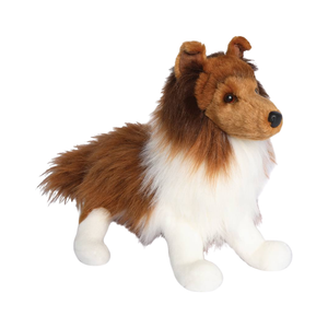 Plush toy dog with brown and white fur on a white background