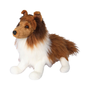 Plush toy dog with brown and white fur on a white background
