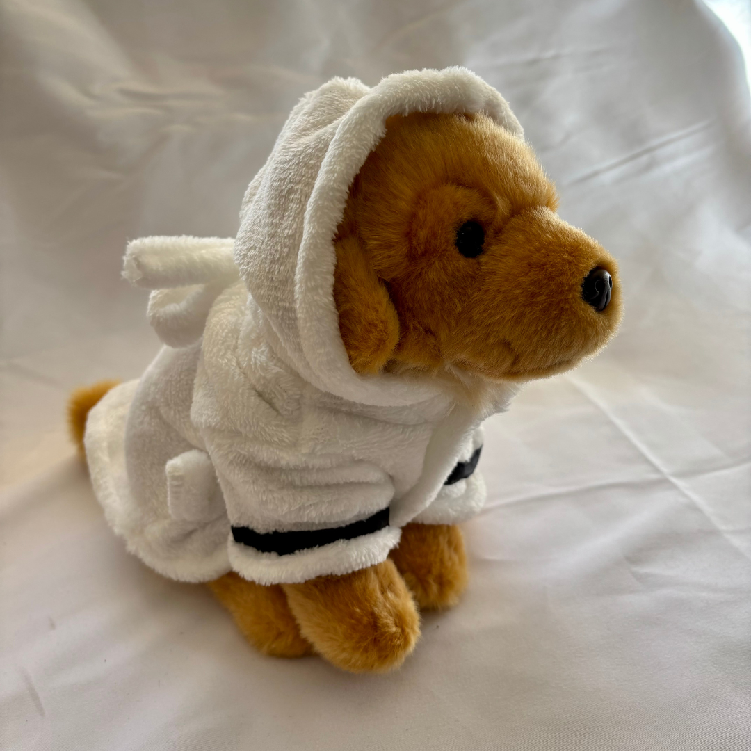 Plush dog wearing White Dressing gown 