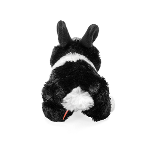 Black and white plush toy with a red tag on a white background