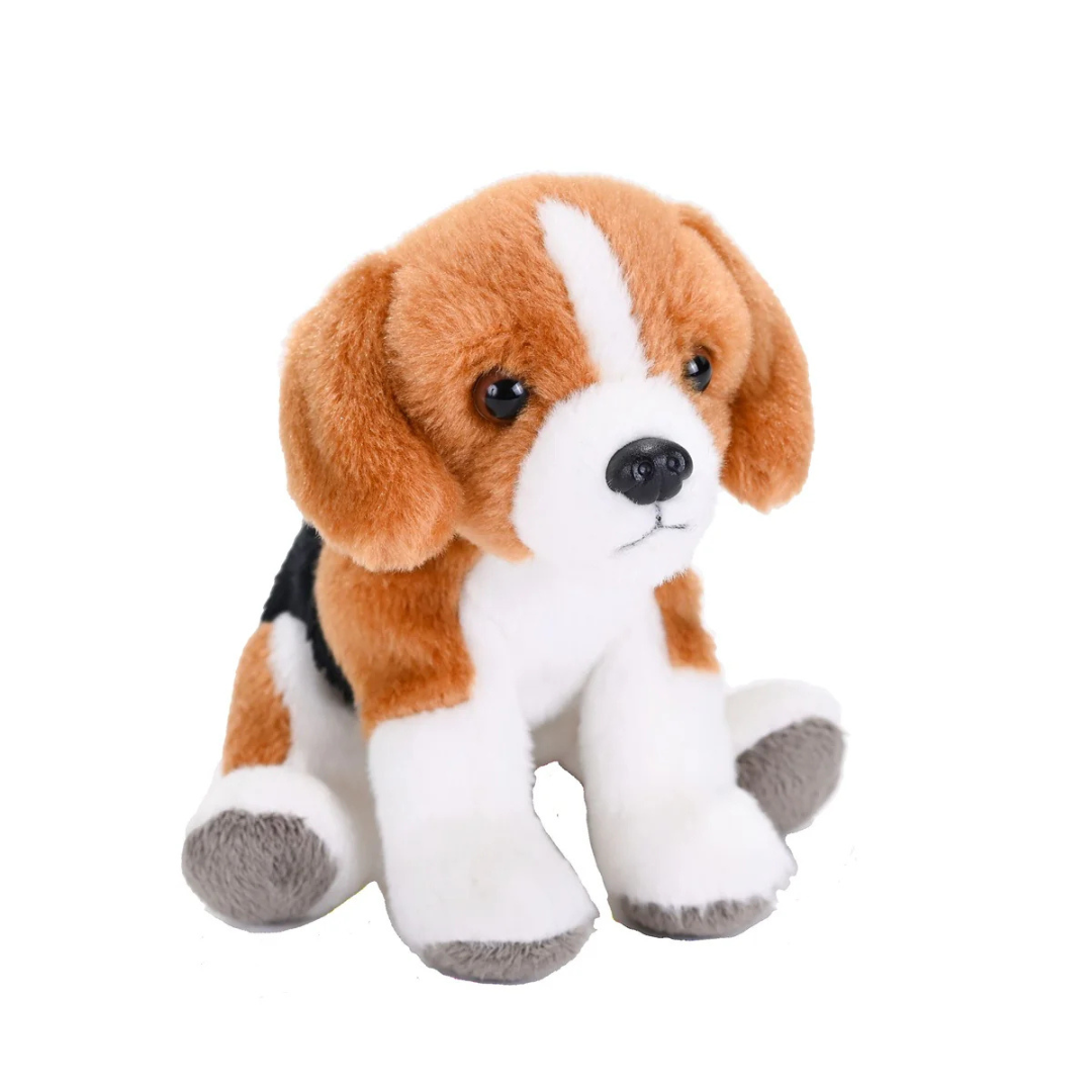 Plush toy dog with brown, white, and black fur on a white background