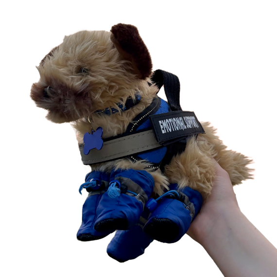 Living nature border terrier emotional support stuffed animal wearing a blue emotional support vest