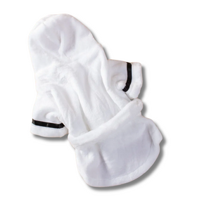 White dressing with black trim on a white background